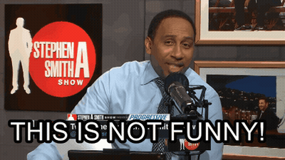 Man At Microphone Saying This Is Not Funny GIF