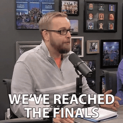 Man At Microphone Saying We've Reached The Finals GIF