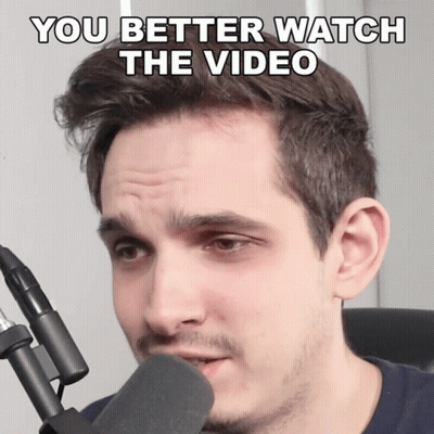 Man At Microphone Saying You Better Watch The Video GIF
