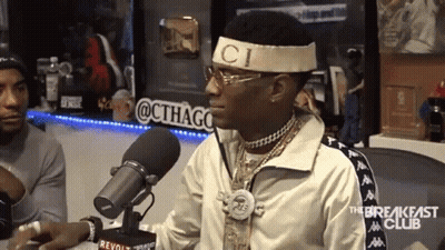 Man At Microphone With C Headband GIF