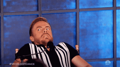 Man At Microphone With #WorldOfDance Shirt GIF