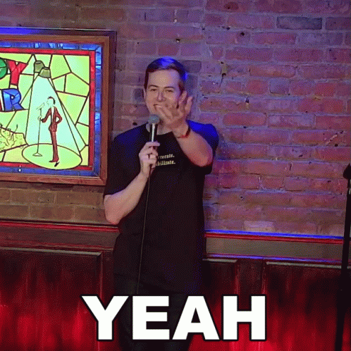 Man At Microphone With Yeah On Bottom GIF