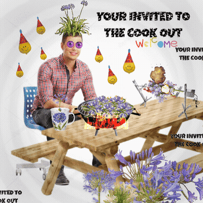 Man At Picnic Table With Flowers On Head GIF