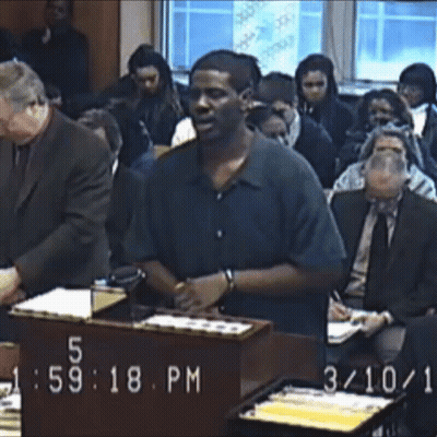 Man At Podium At 5:59 PM GIF