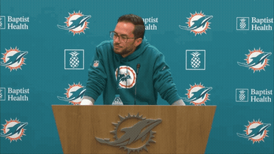 Man At Podium In Front Of Baptist Health GIF