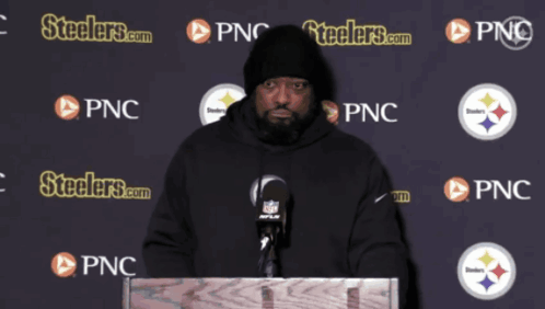Man At Podium In Front Of Steelers.com And PNC Logos GIF