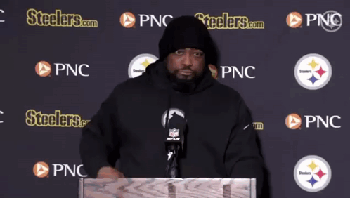 Man At Podium In Front Of Steelers.com Wall GIF