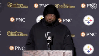 Man At Podium In Front Of Wall With Steelers.com And PNC Logos GIF