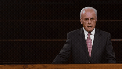 Man At Podium With John MacArthur Quote GIF