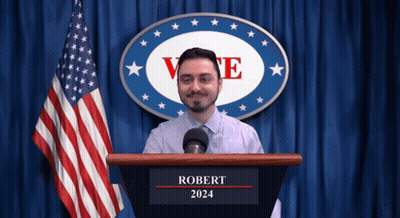 Man At Podium With Robert 2024 GIF