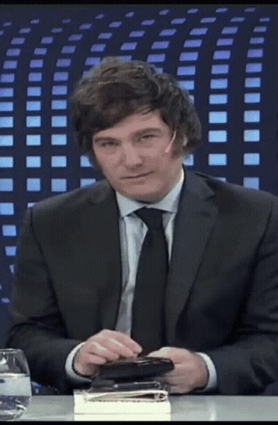 Man At Table In Suit And Tie GIF