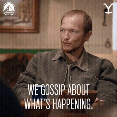 Man At Table We Gossip About What's Happening GIF