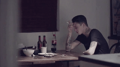 Man At Table With Coca Cola Bottle GIF