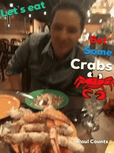 Man At Table With Crabs Saying Let's Eat GIF