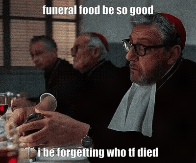 Man At Table With Wine Saying Funeral Food GIF