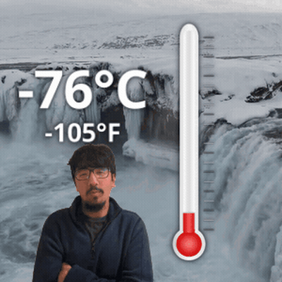 Man At Waterfall With Thermometer -76 Degrees Celsius GIF