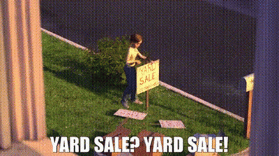 Man At Yard Sale Sign GIF