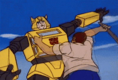 Man Attacked By Transformer Robot GIF