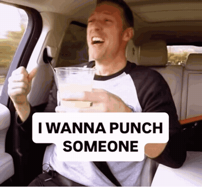 Man Back Seat Holding Drink Saying I Wanna Punch Someone GIF