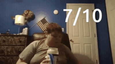 Man Before Blue Wall With 7 And 10 GIF