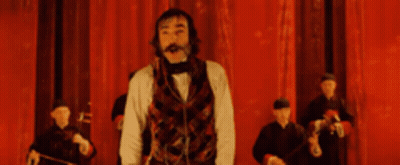 Man Before Red Curtain Saying Whoopie Daisy GIF