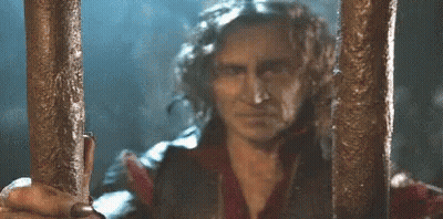 Man Behind Bars Saying I'm Waiting GIF
