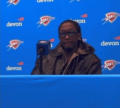 Man Behind Blue Banner Saying Watch The Games GIF