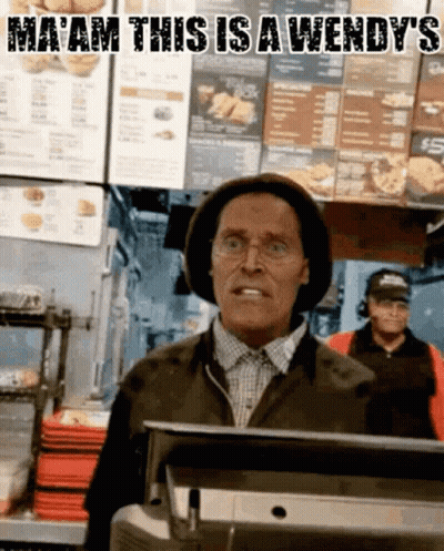 Man Behind Counter At Wendy's GIF