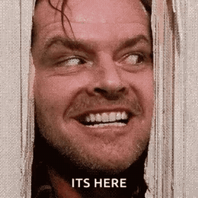 Man Behind Curtain Saying It's Here GIF