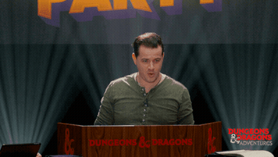 Man Behind Dungeons & Dragons Podium GIF