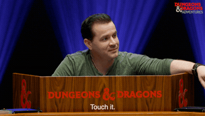 Man Behind Dungeons & Dragons Podium GIF