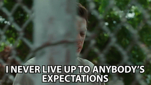 Man Behind Fence With Expectations Quote GIF