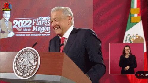 Man Behind Podium Saying 2022 Flores Magon GIF