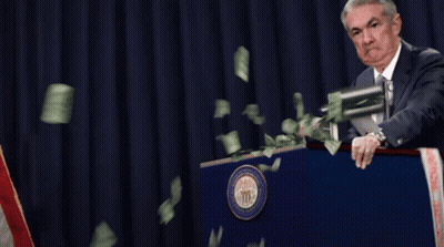 Man Behind Podium With Money Falling GIF