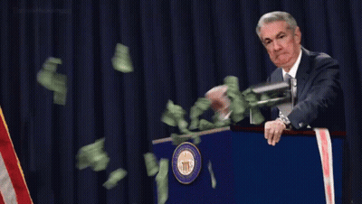 Man Behind Podium With Money Falling GIF