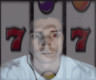 Man Behind Slot Machine With Number 7 GIF