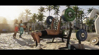 Man Bench Pressing On Beach GIF