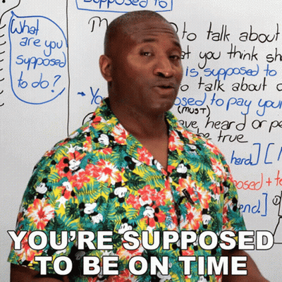 Man Beside White Board Saying You're Supposed To Be On Time GIF