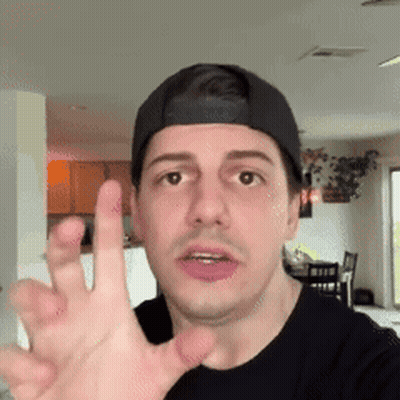 Man Black Shirt Baseball Cap High-Fiving Funny Face GIF
