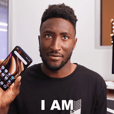 Man Black Shirt Holding Phone Saying I Am GIF