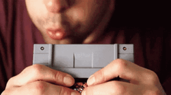 Man Blow His Nintendo Game GIF
