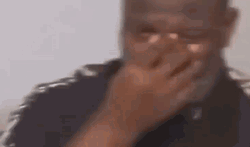 Man Blowing Holding In Laugh GIF