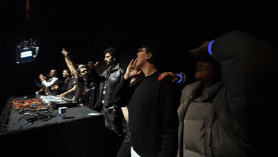 Man Blowing Kiss At Concert GIF
