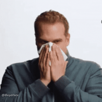 Man Blowing Nose With Napkin GIF