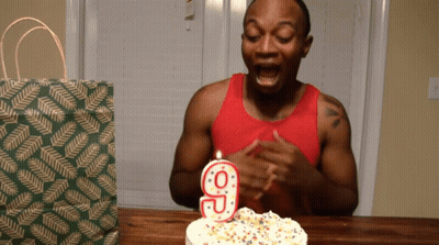 Man Blowing Out Number 9 Candle GIF
