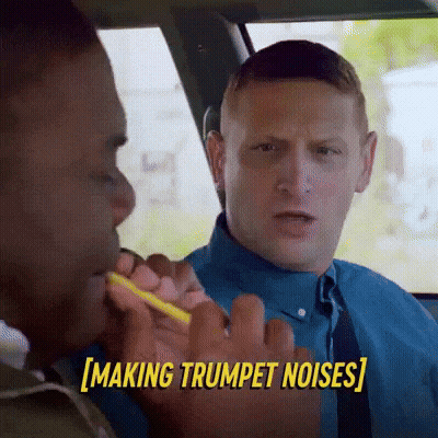 Man Blowing Trumpet Making Trumpet Noises GIF