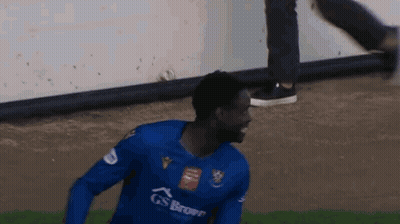 Man Blue Gs Brown Jersey Running On Soccer Field GIF