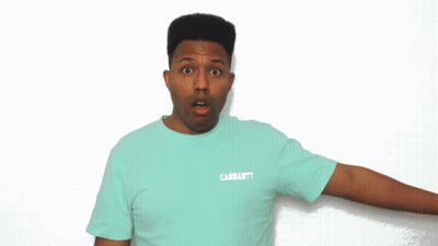 Man Blue Shirt Eating Popcorn Red-White Striped Container GIF