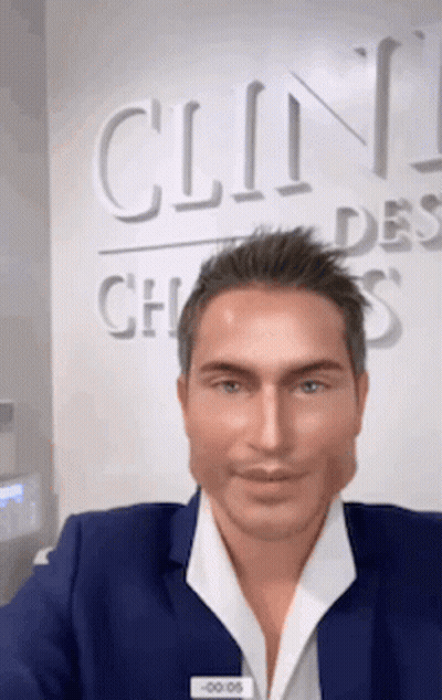 Man Blue Suit Clin Des Choses Sign GIF