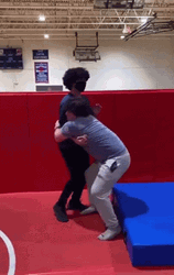Man Body Slam Woman On A Mattress GIF